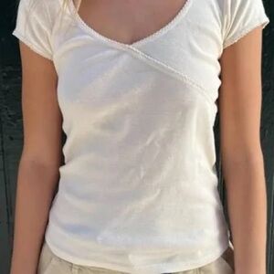 Size small Brandy Melville Starla scalloped trip cream top